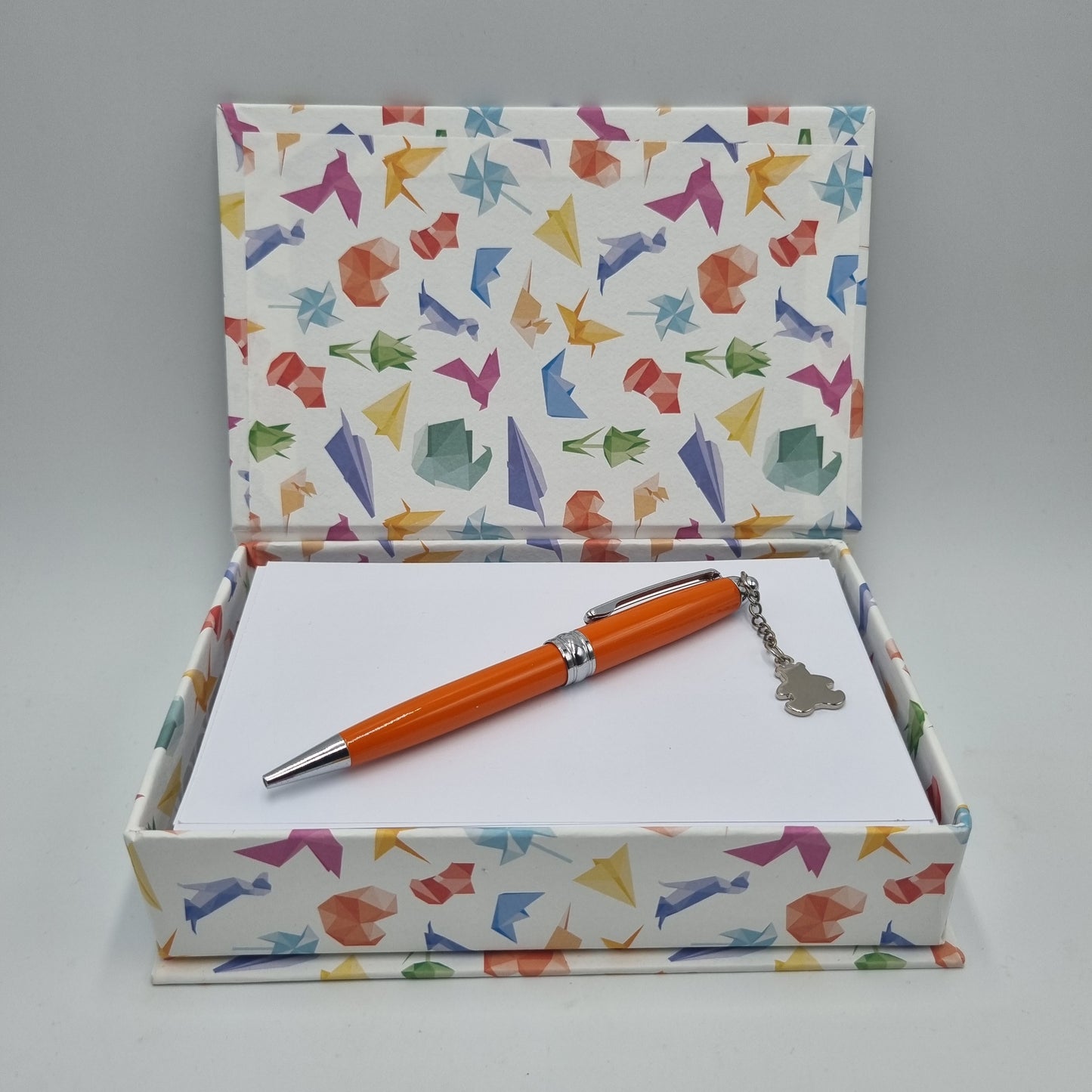 Set scatola portabiglietti e penna arancione