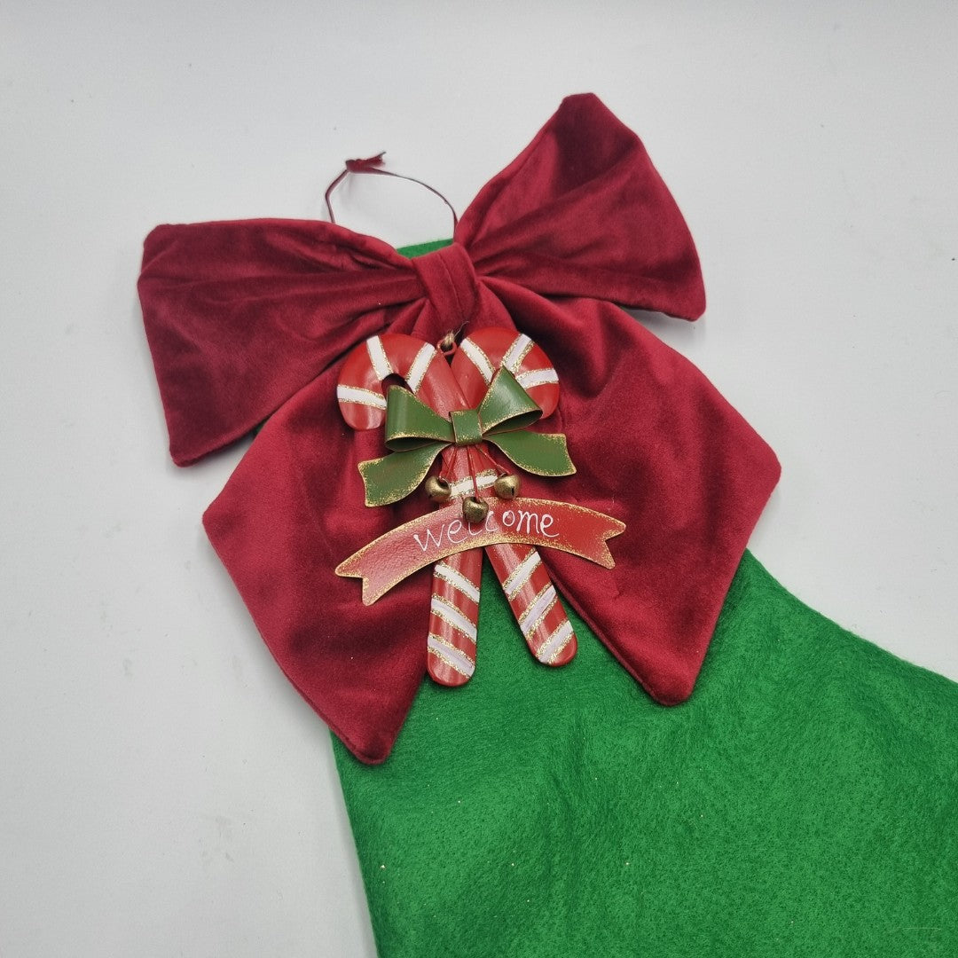 Calza della Befana verde con candy kane