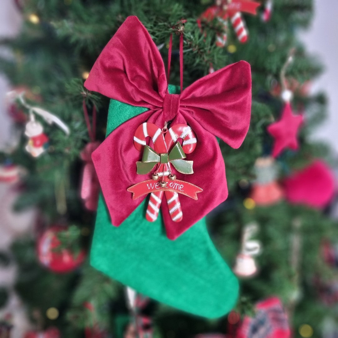 Calza della Befana verde con candy kane
