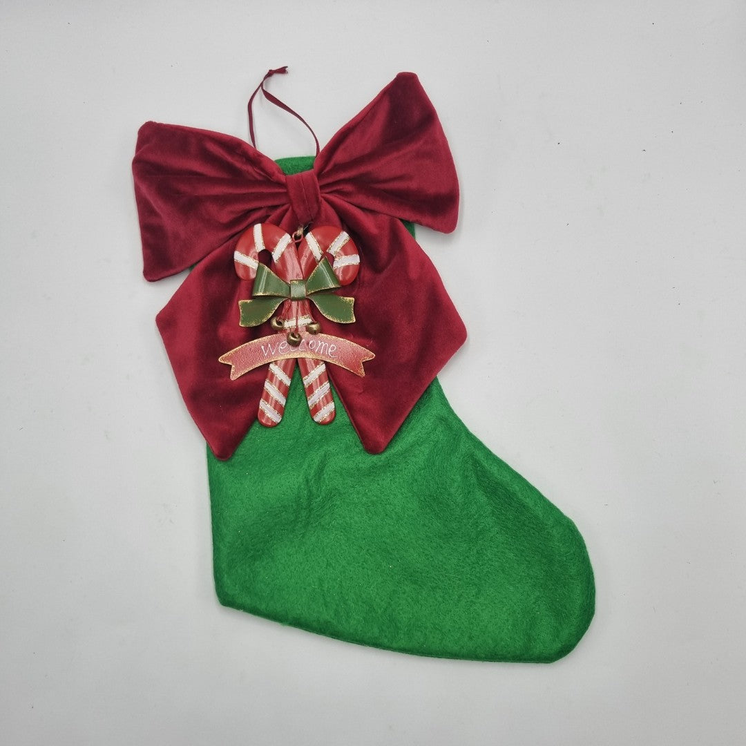 Calza della Befana verde con candy kane