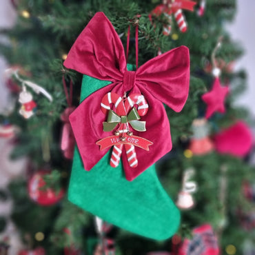 Calza della Befana verde con candy kane