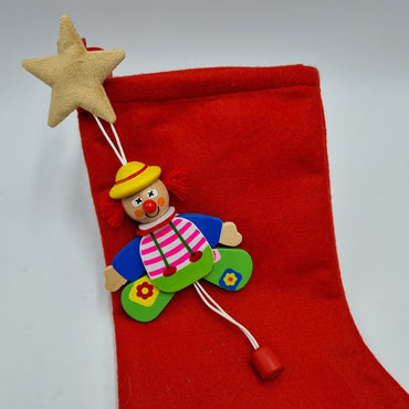 Calza della befana rossa con pagliaccio in legno