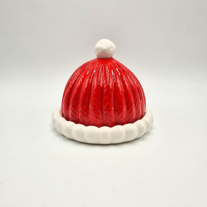 Piatto in ceramica con coperchio rosso e casetta di Natale
